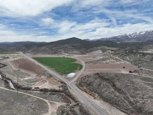 Birds eye view of property with a mountain view