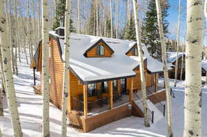 View of snow covered property