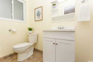 Bathroom with toilet and vanity