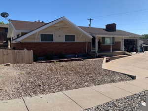 Single story home featuring a garage