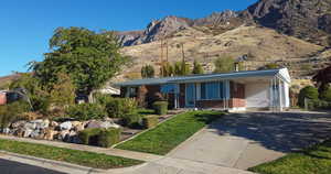 Ranch-style house featuring a mountain view