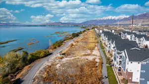 Bird's eye view with a water and mountain view