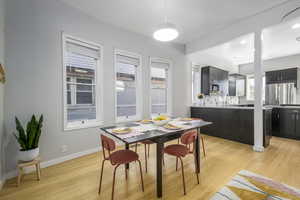 Dining area featuring light wood-type flooring