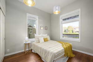 Bedroom featuring dark hardwood / wood-style flooring