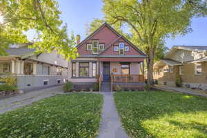 View of front of property with a front yard