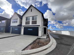 View of front of home with a garage