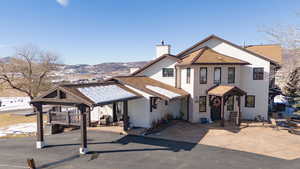 View of front of house with a mountain view