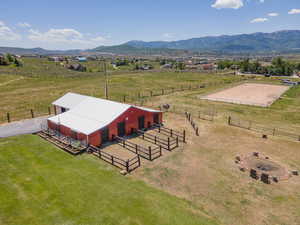 Aerial view featuring a rural view and a mountain view