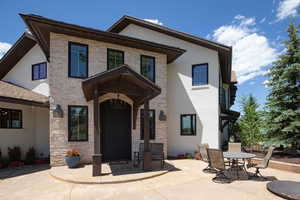 Contemporary home featuring a patio