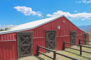 View of stable with a mountain view