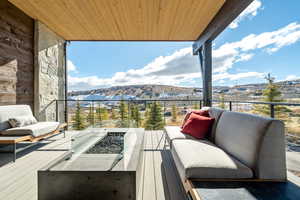 Balcony featuring an outdoor living space and a mountain view