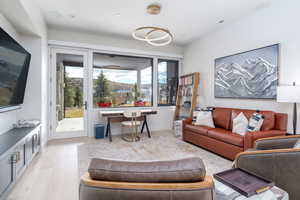 Living room with light wood-type flooring