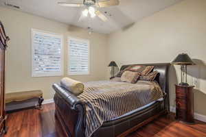 Bedroom 4 on the lower level with 9' ceilings and LVT flooring.