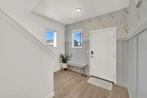 Foyer featuring light wood-type flooring