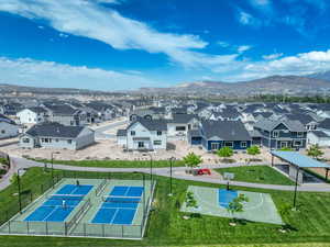 Birds eye view of property with a mountain view