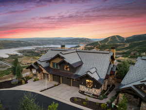 Aerial view at dusk with a water and mountain view