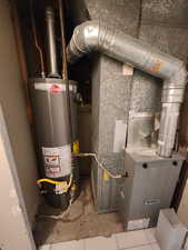 Utility room with gas water heater