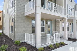 View of property exterior with a balcony