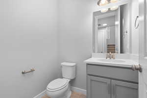 Bathroom featuring toilet and vanity