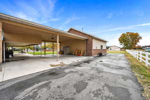 View of vehicle parking with a carport