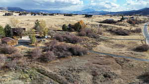 Property view of mountains featuring a rural view