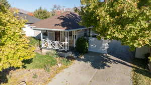 Bungalow featuring covered porch