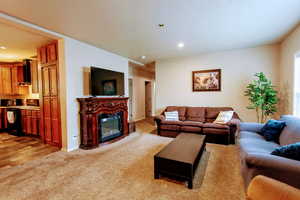 Living room with light hardwood / wood-style floors