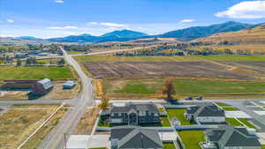 Birds eye view of property with a mountain view