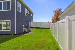 View of yard featuring cooling unit