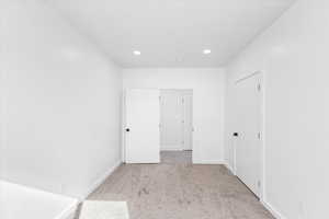 Interior space with light colored carpet