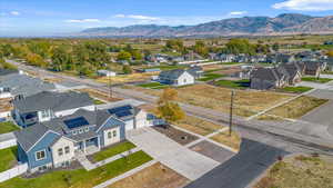 Drone / aerial view featuring a mountain view