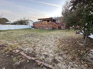 View of yard with a deck