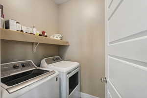 Clothes washing area with separate washer and dryer