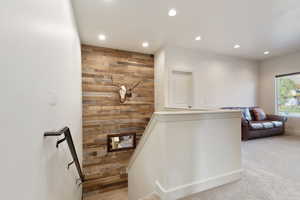 Stairs with wooden accent walls