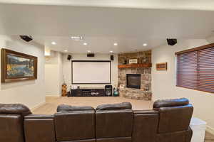 Cinema/family  room featuring gas fireplace