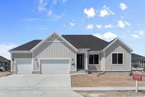 View of front of home featuring a garage