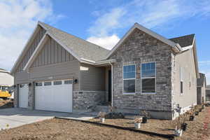 View of front of home featuring a garage