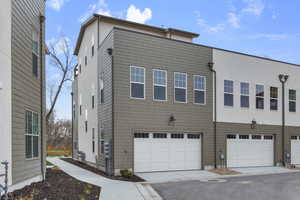 View of front of home featuring a garage