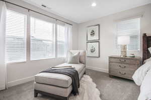 View of carpeted bedroom