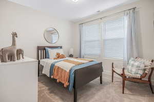 Bedroom featuring carpet flooring