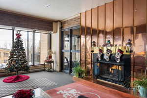 Carpeted living room featuring baseboard heating