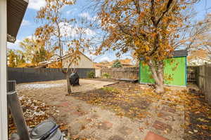 View of yard featuring a storage shed