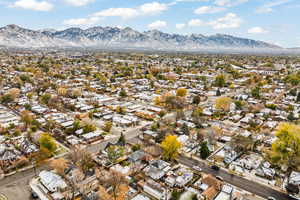 Birds eye view of property with a mountain view