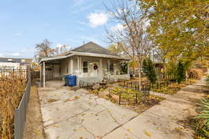 Exterior space featuring a porch and a carport