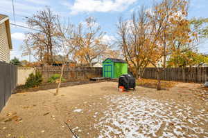 View of yard featuring a storage shed