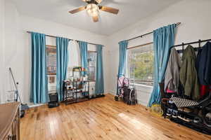 Miscellaneous room featuring light hardwood / wood-style flooring and ceiling fan