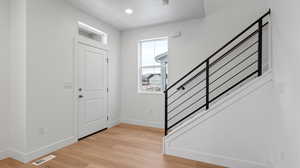 Entryway with light wood-type flooring