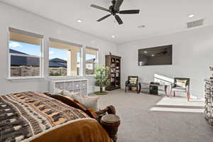 Bedroom featuring ceiling fan and carpet flooring