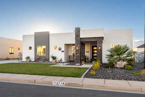 View of front of house with a front yard