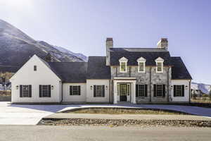 View of front of house with a mountain view